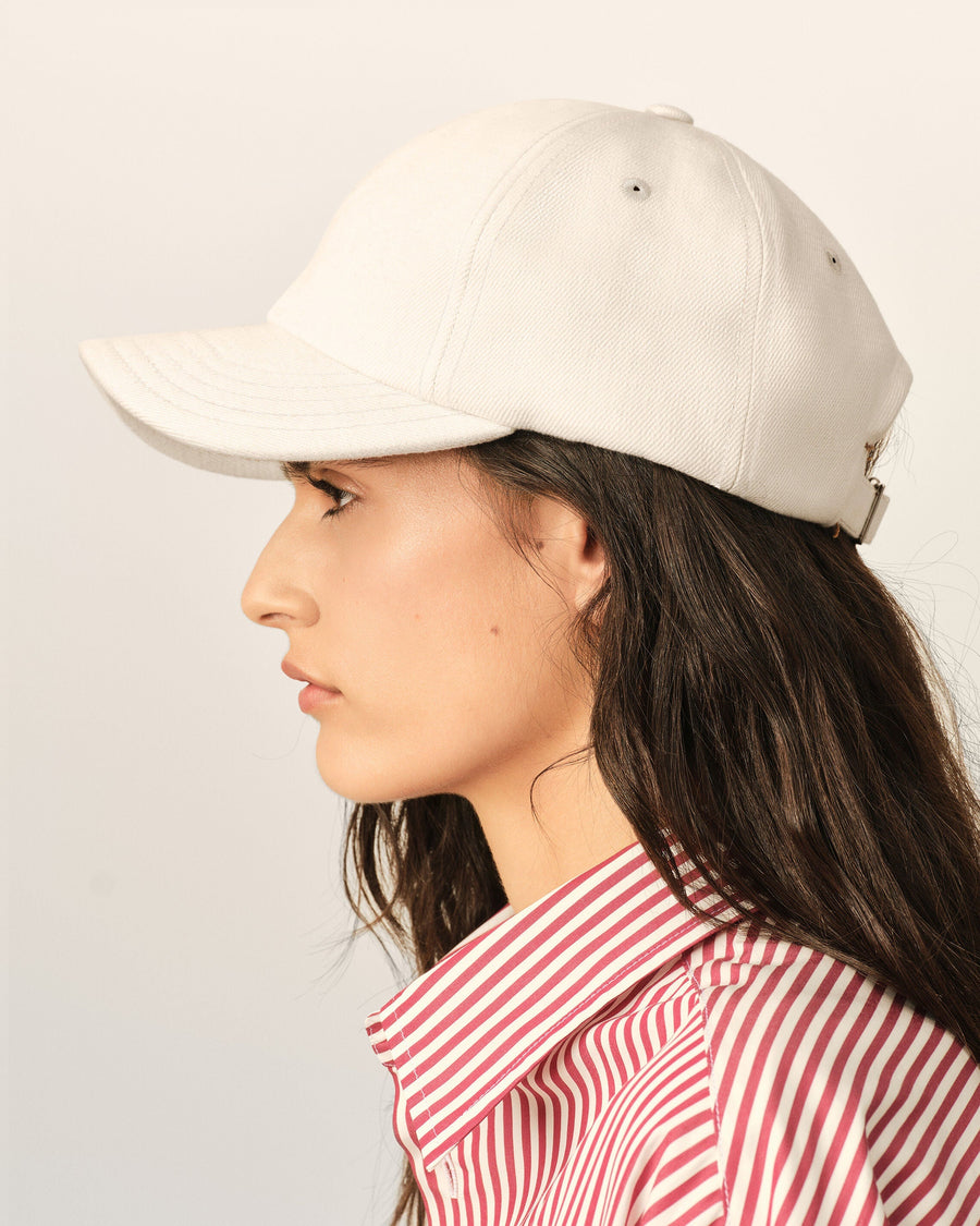White cotton cap with Ami de Coeur arrow