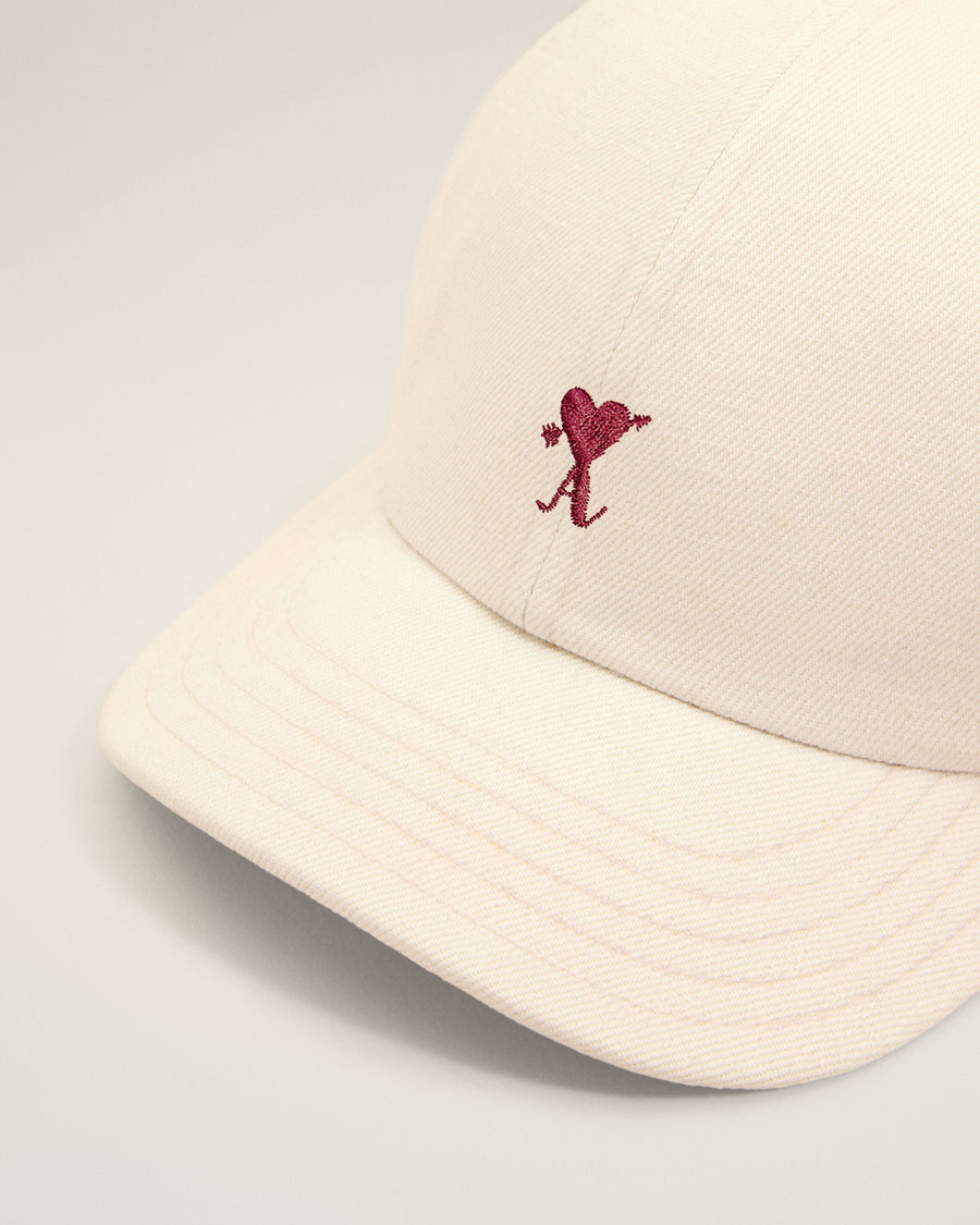 White cotton cap with Ami de Coeur arrow