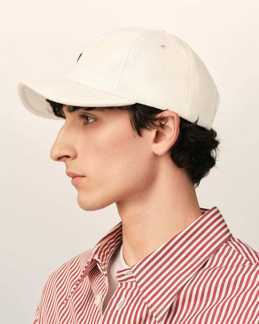 White cotton cap with Ami de Coeur arrow