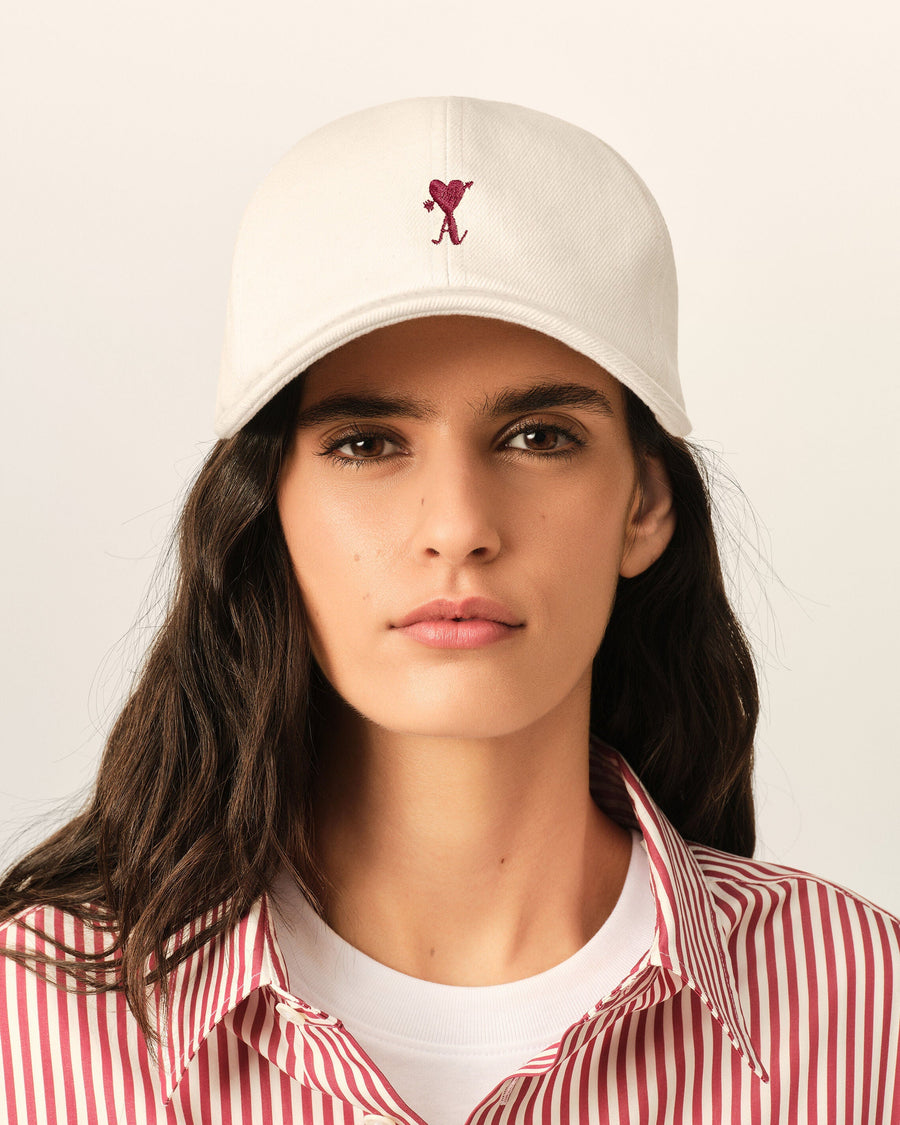 White cotton cap with Ami de Coeur arrow