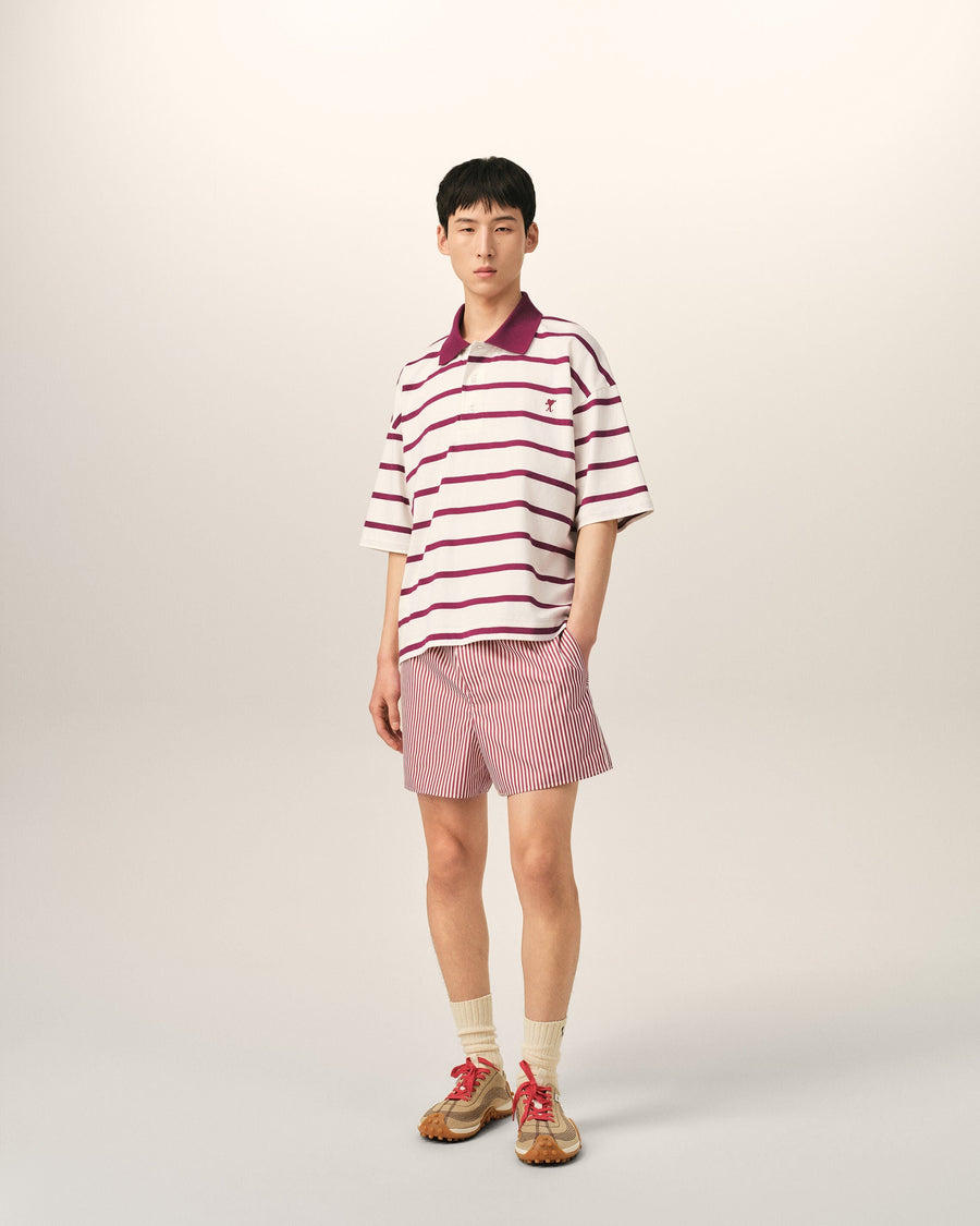White cotton polo with Ami de Coeur arrow