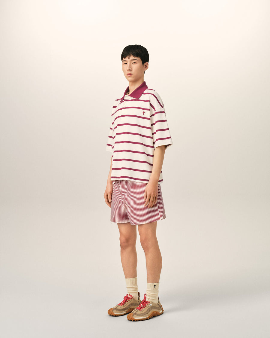White cotton polo with Ami de Coeur arrow