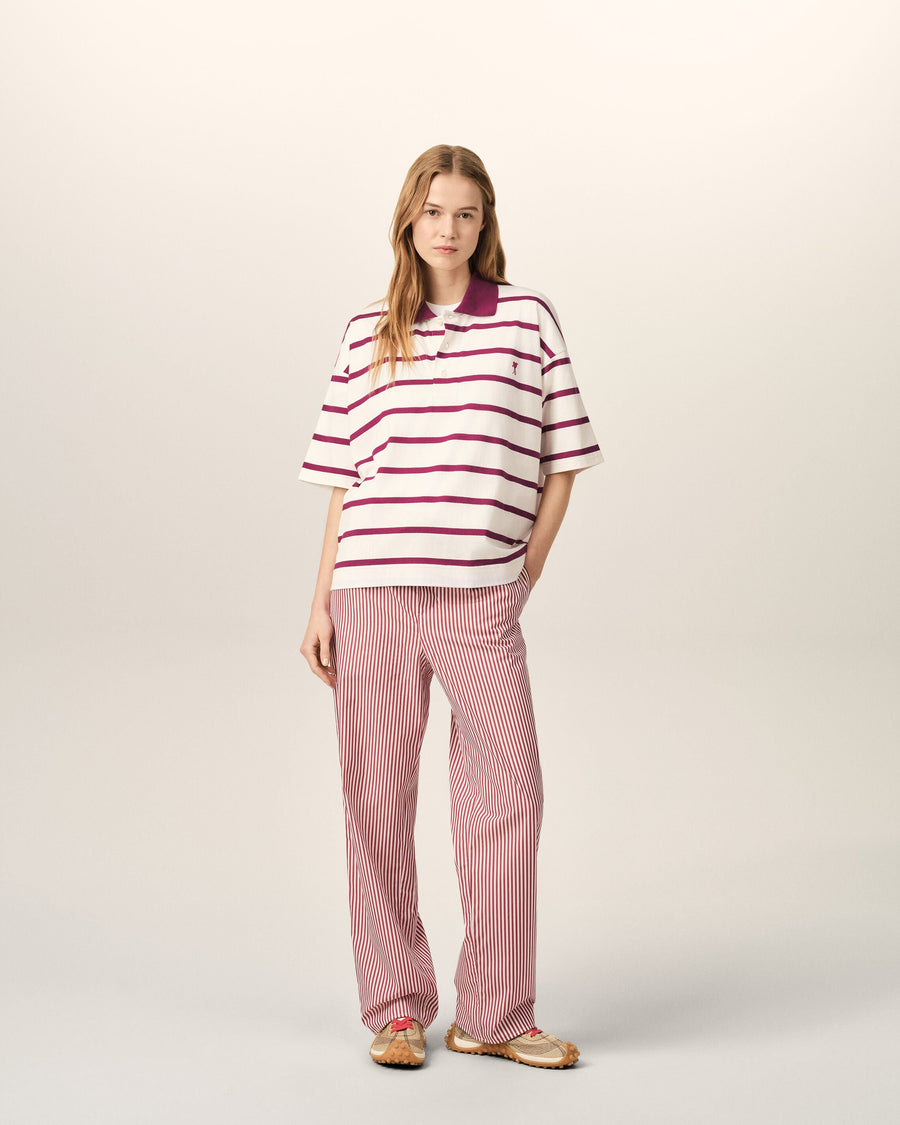White cotton polo with Ami de Coeur arrow