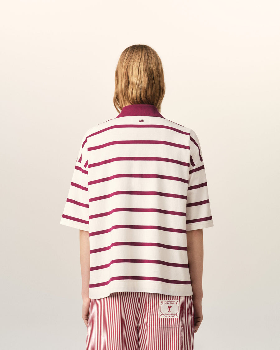 White cotton polo with Ami de Coeur arrow