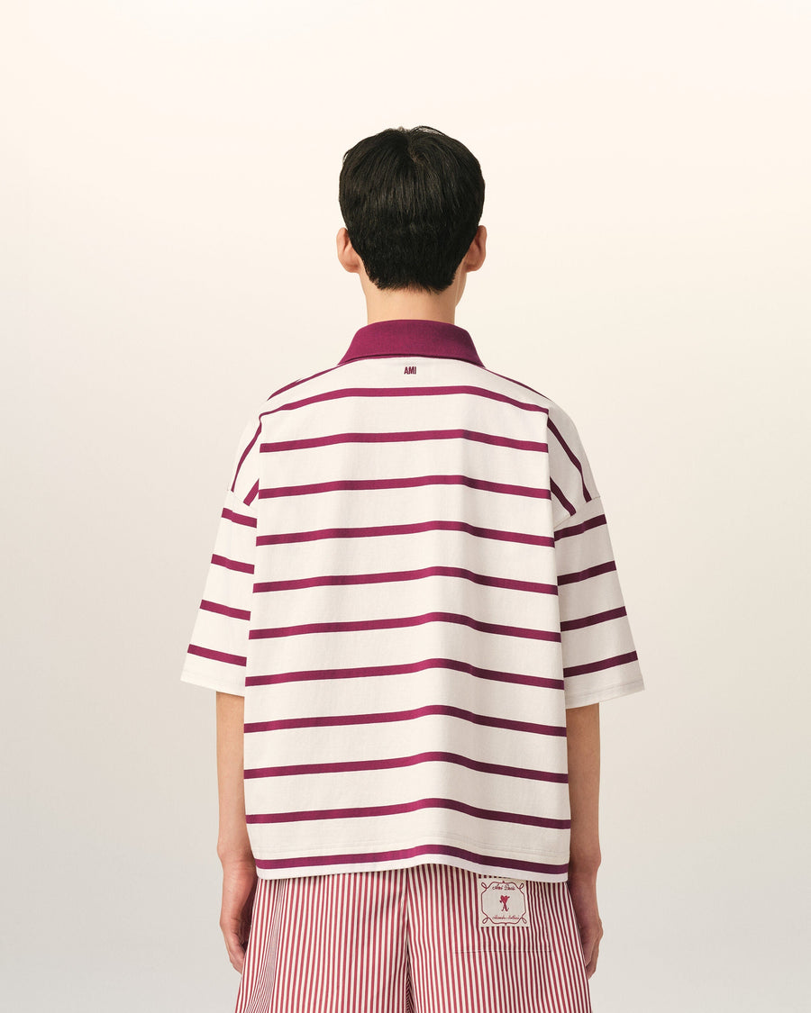 White cotton polo with Ami de Coeur arrow