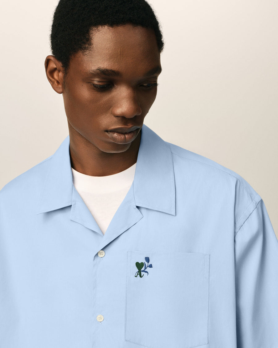 Blue boxy cotton short-sleeve shirt with Ami de Coeur tulip
