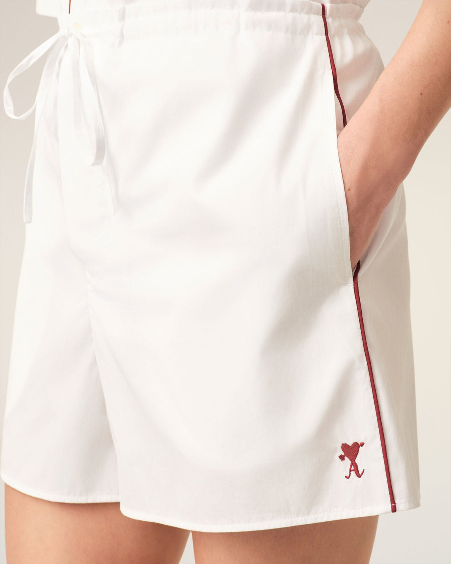 White cotton shorts with Ami de Coeur arrow