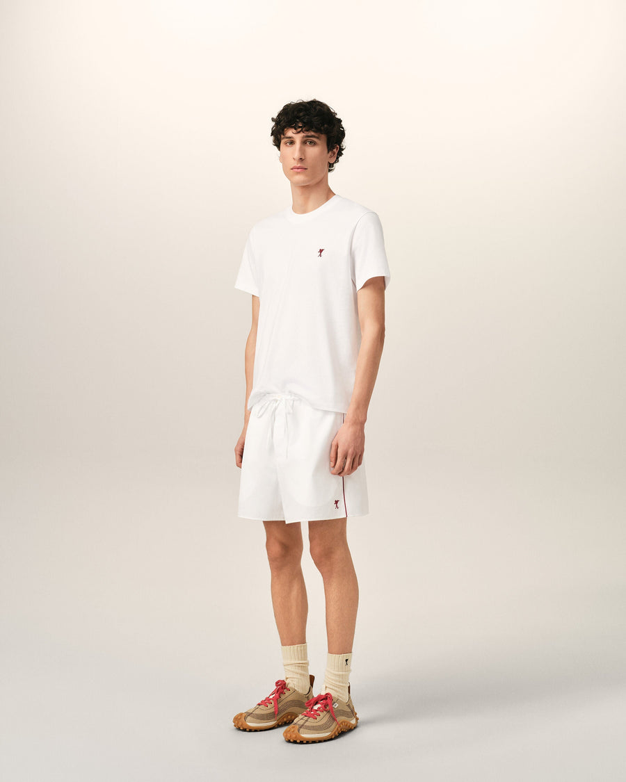 White cotton shorts with Ami de Coeur arrow