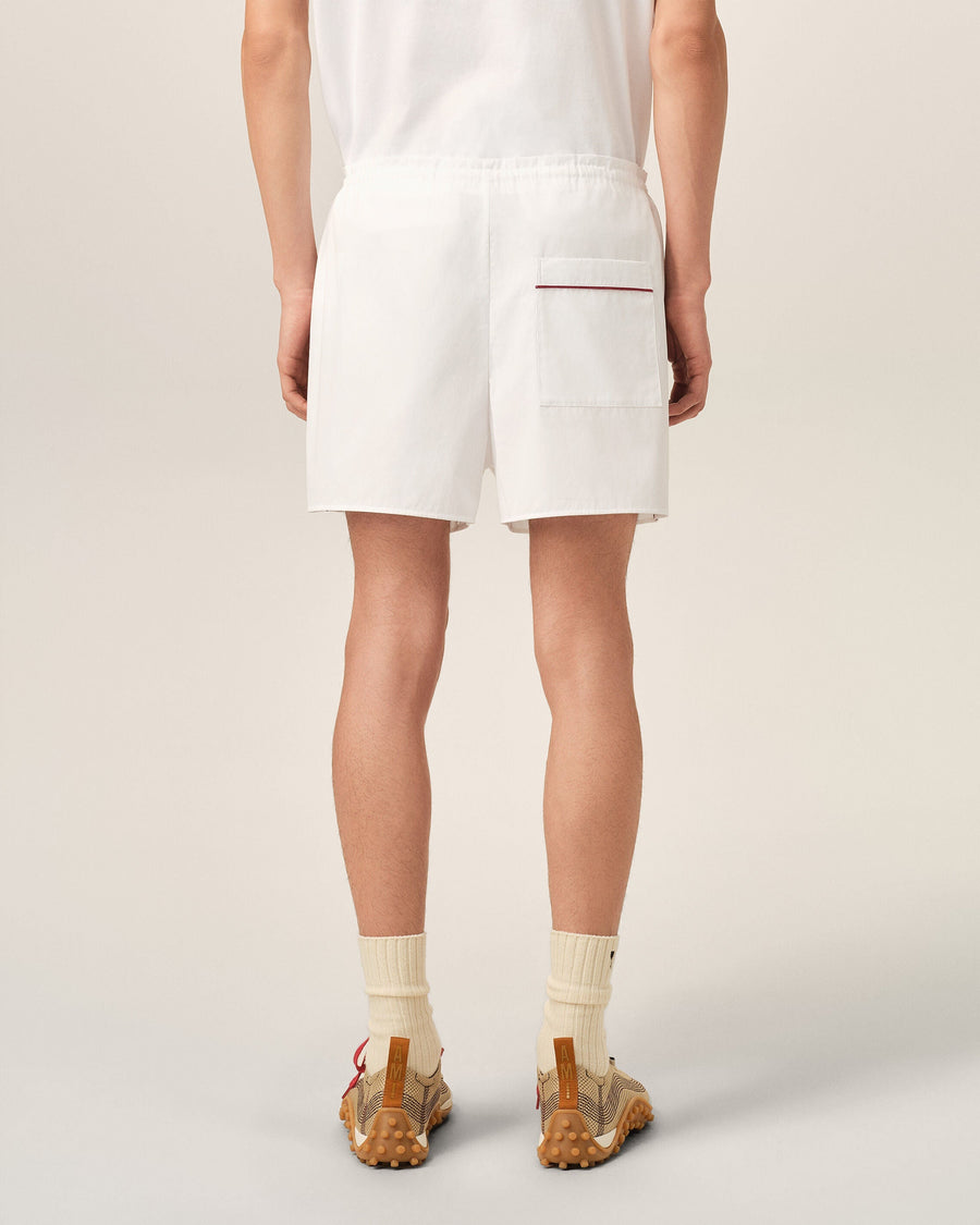White cotton shorts with Ami de Coeur arrow