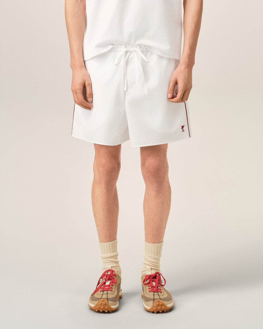 White cotton shorts with Ami de Coeur arrow