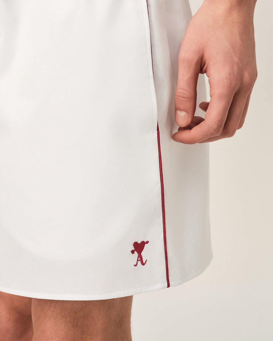 White cotton shorts with Ami de Coeur arrow