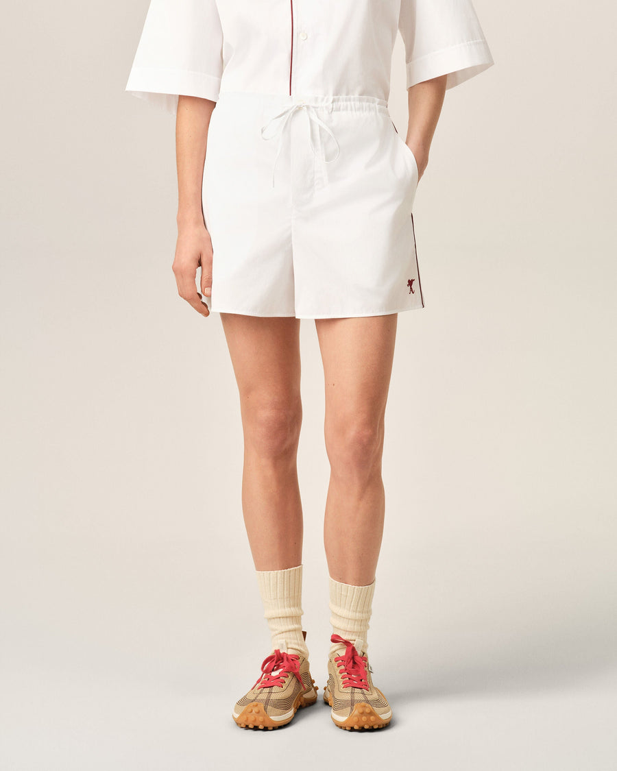White cotton shorts with Ami de Coeur arrow