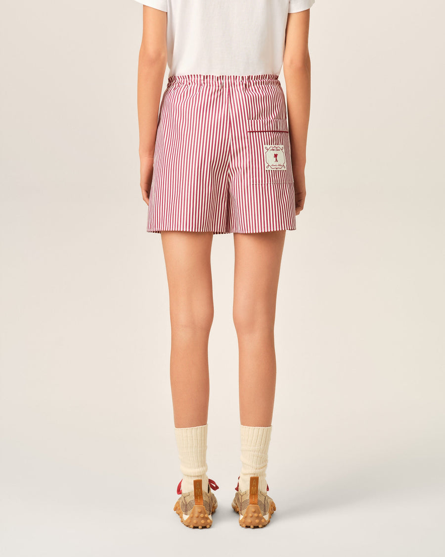 Red striped cotton shorts with Ami de Coeur arrow
